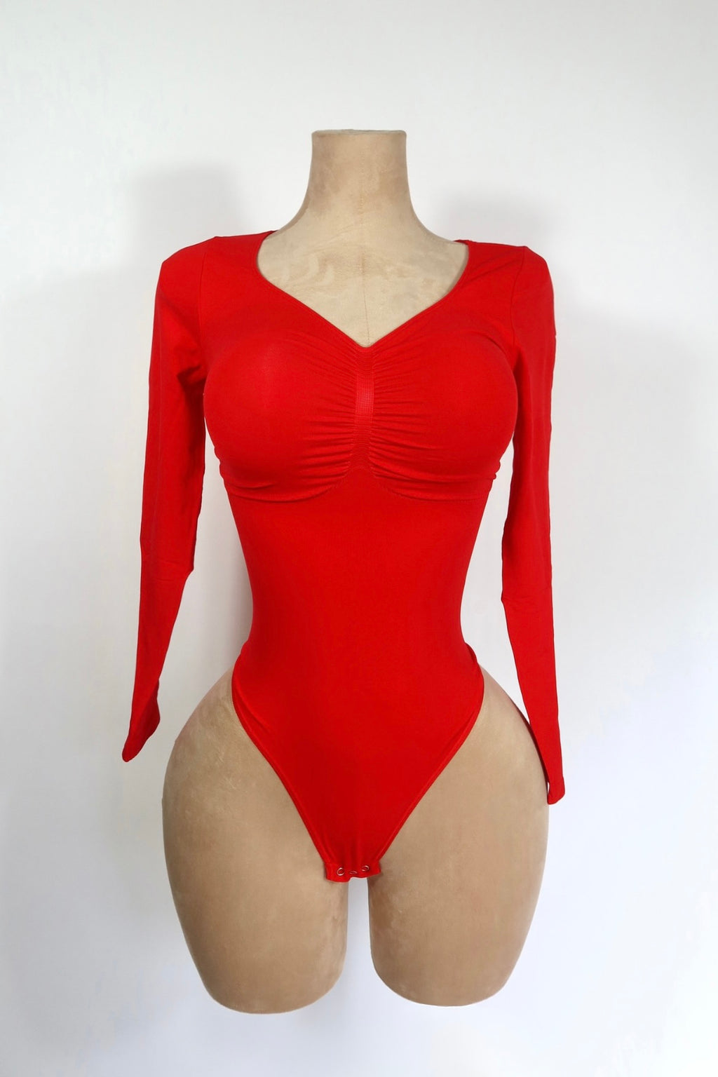 Body sculpt de manga larga con cuello "V"
