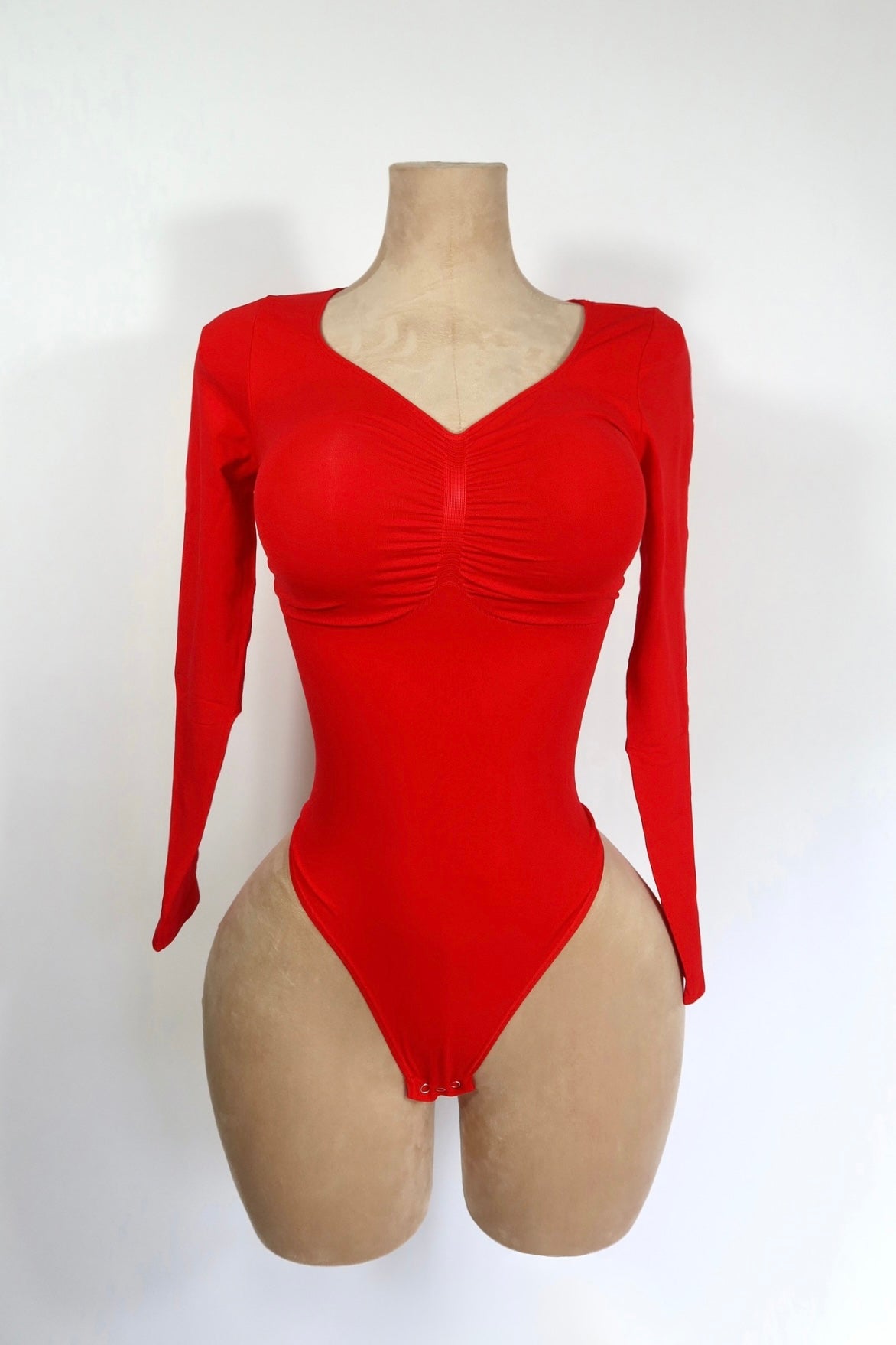 Body sculpt de manga larga con cuello "V"